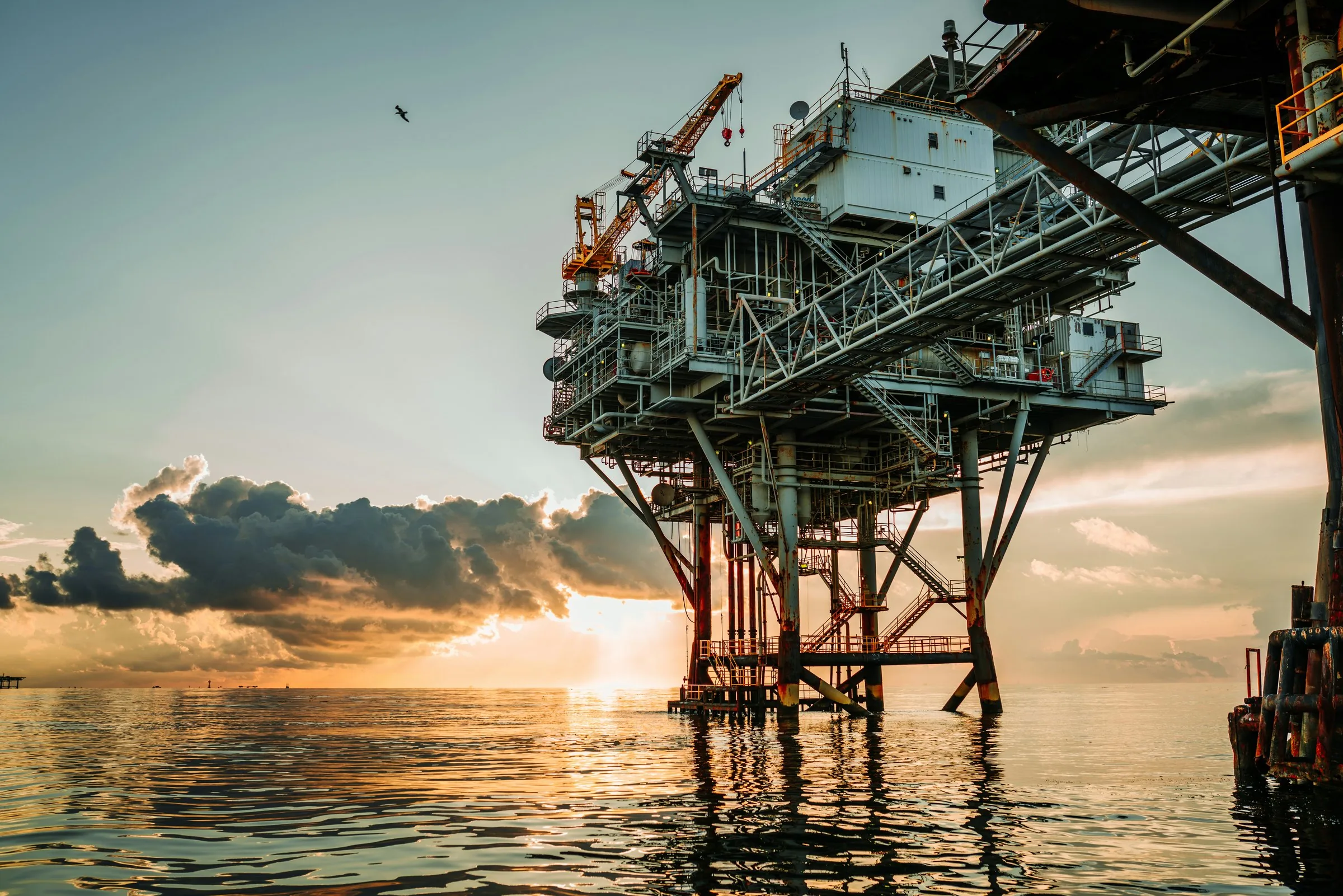 Offshore production platform at golden hour
