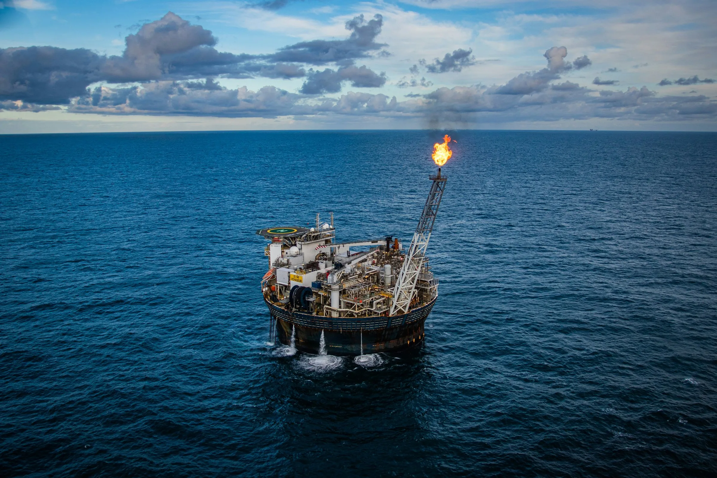 Floating production vessel with a gas flare at sea